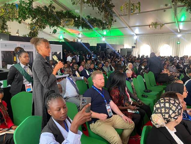 Delegates seated in a conference hall at the Africa Climate Summit 2023